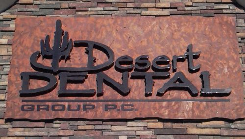 Desert dental Group - pan channel letters on a stone background